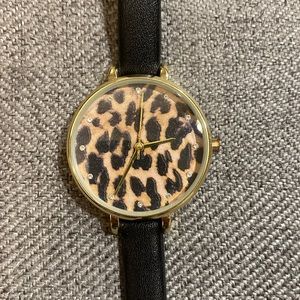 Cheetah, gold and black watch